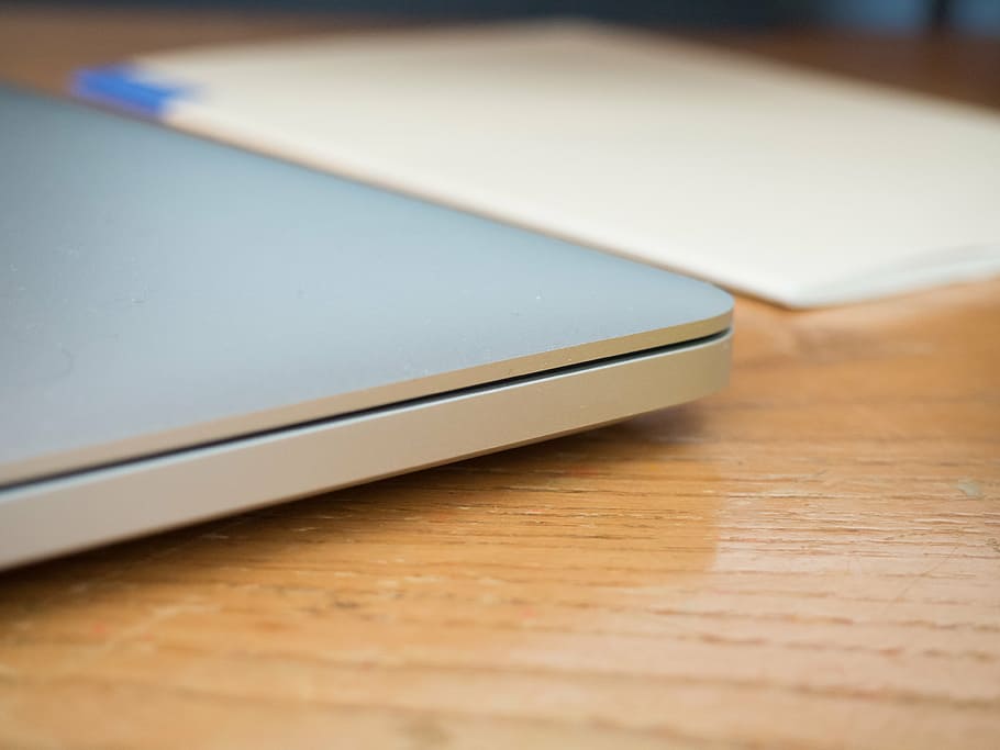 gray laptop computer placed on brown wooden board, tilt, shift HD wallpaper