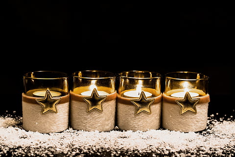 four clear votive candles inlined on gray surface, third advent HD wallpaper