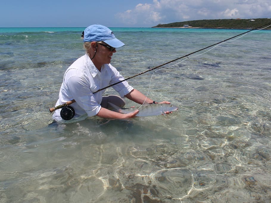 man holding fish, bone fish, fly fishing, bahama, bone-fish, woman