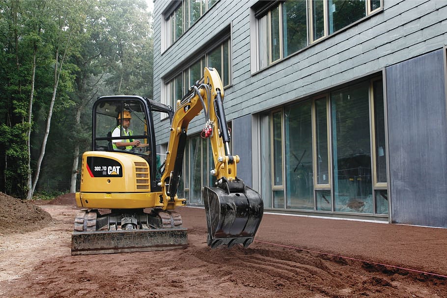 man using black and yellow excavator, cat, 302, 7d, mini excavator, HD wallpaper