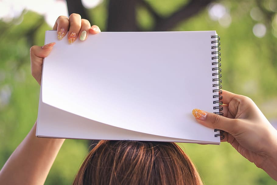 person holding white plain paper, outdoors, women, people, females HD wallpaper