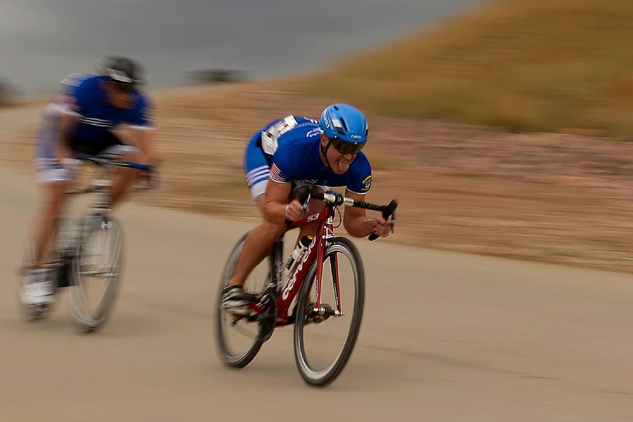man riding on bicycle on concrete road, cycling, cyclists, bicycles HD wallpaper