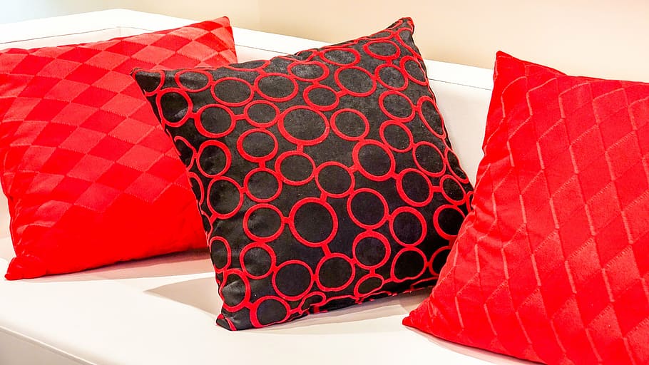 three red throw pillows on white sofa, cozy, furniture, seat cushions, HD wallpaper