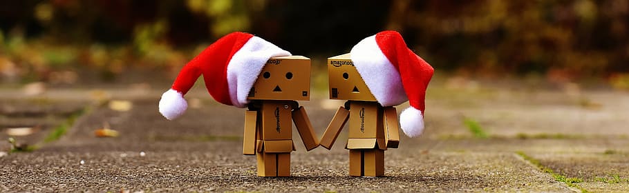 selective focus photography of two cardboard box robots wearing Santa hat HD wallpaper