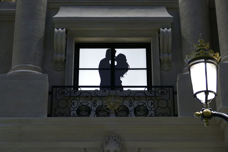 silhouette of man and woman kissing near window, Image, Macau