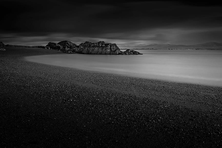 grayscale photography of body of water near mountain, grayscale photo of body of water near mountain range HD wallpaper