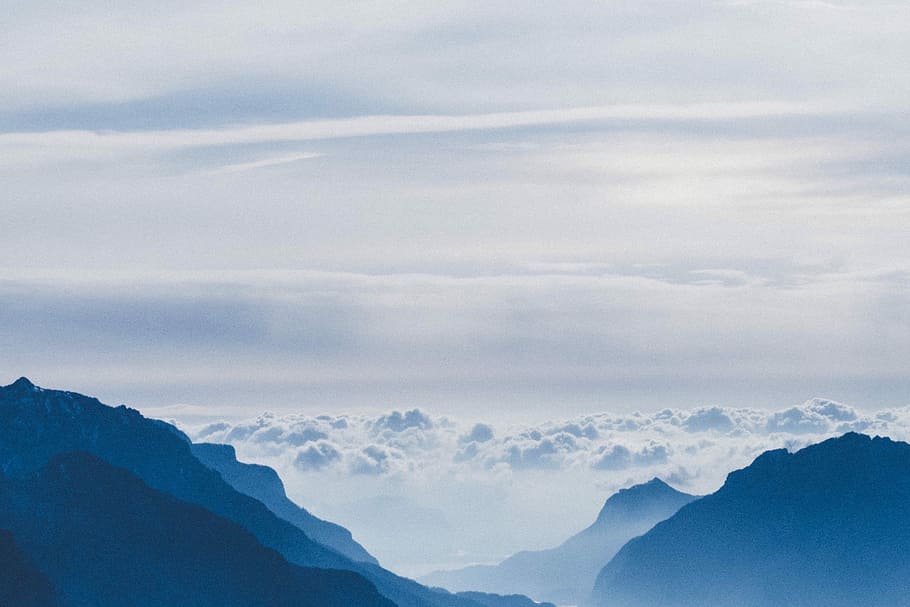 silhouette of mountain with clouds during daytime, mountains covered with clouds during daytime HD wallpaper