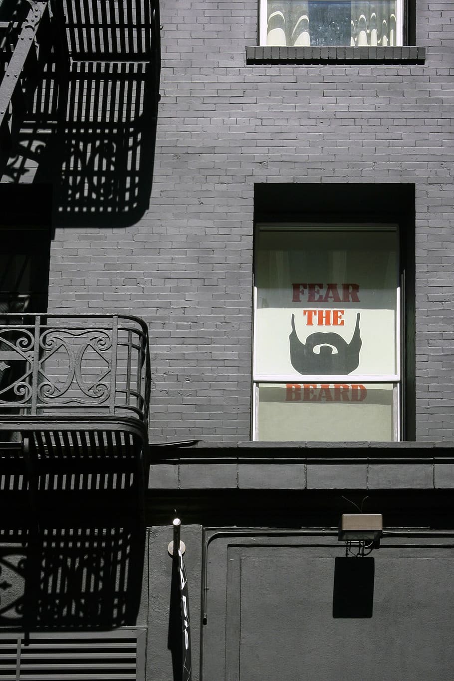 Fear The Beard signboard, selective color photography of fear the beard sign in building HD wallpaper