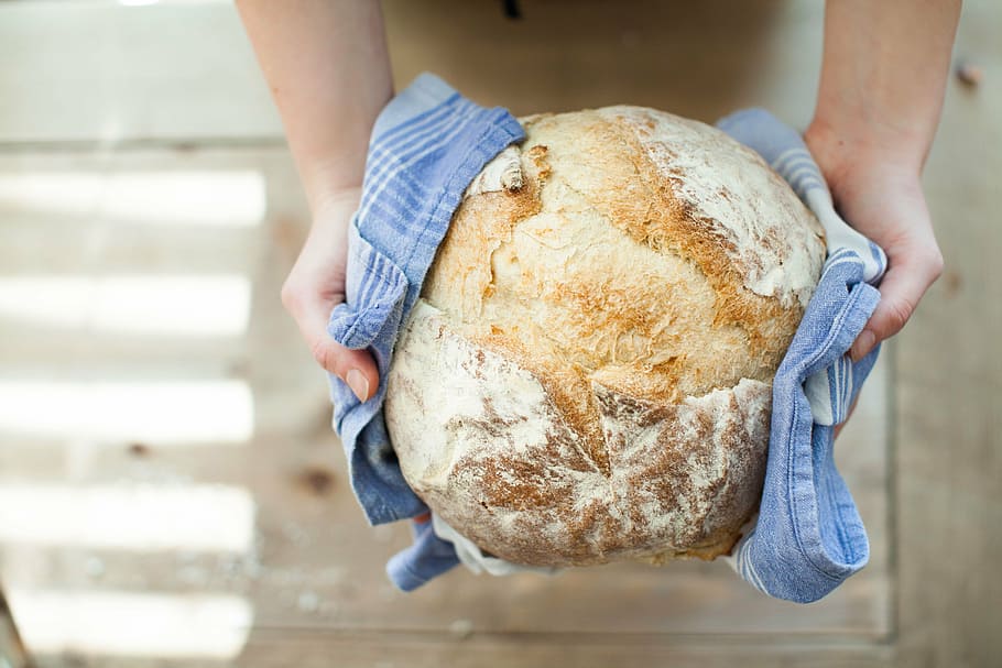 person holding baked bread, cooking, kitchen, home made, food HD wallpaper