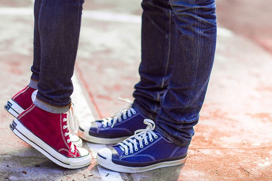 HD wallpaper: two person wearing blue denim jeans, blue and red high-top  sneakers standing | Wallpaper Flare