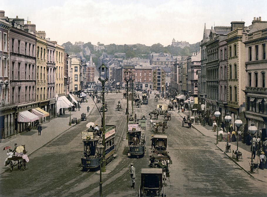 Patrick Street around 1900 with cars and people in Cork, Ireland