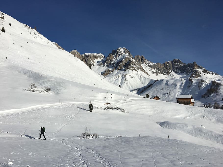 person walking on snow-capped ground, landscape, mountain, tracks HD wallpaper