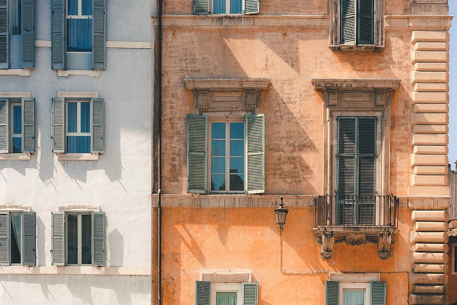 brown building beside white building, brown and white painted walls HD wallpaper