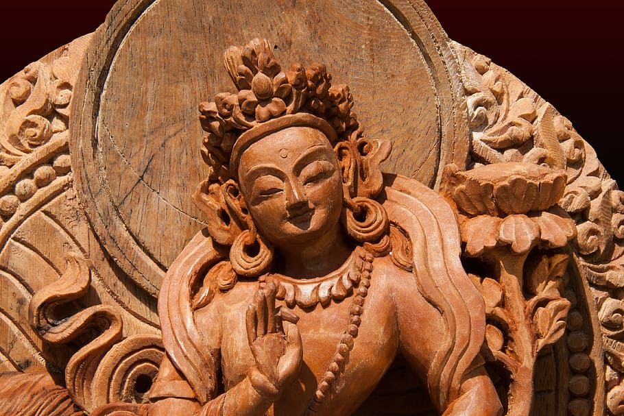 closeup photo of Hindu Deity statue, tara, female, peaceful, manifestation