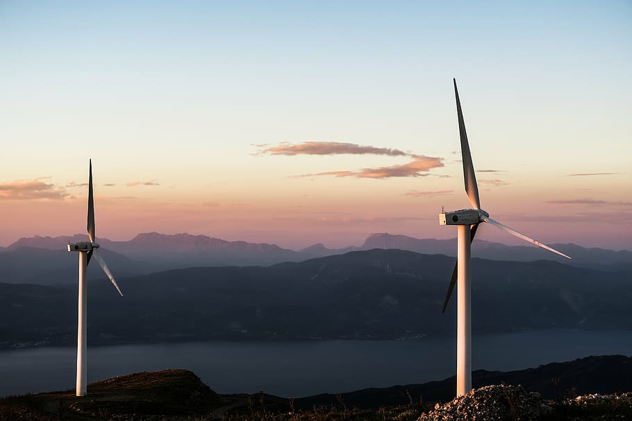 lake, mountain range, mountains, river, sky, water, wind turbines HD wallpaper
