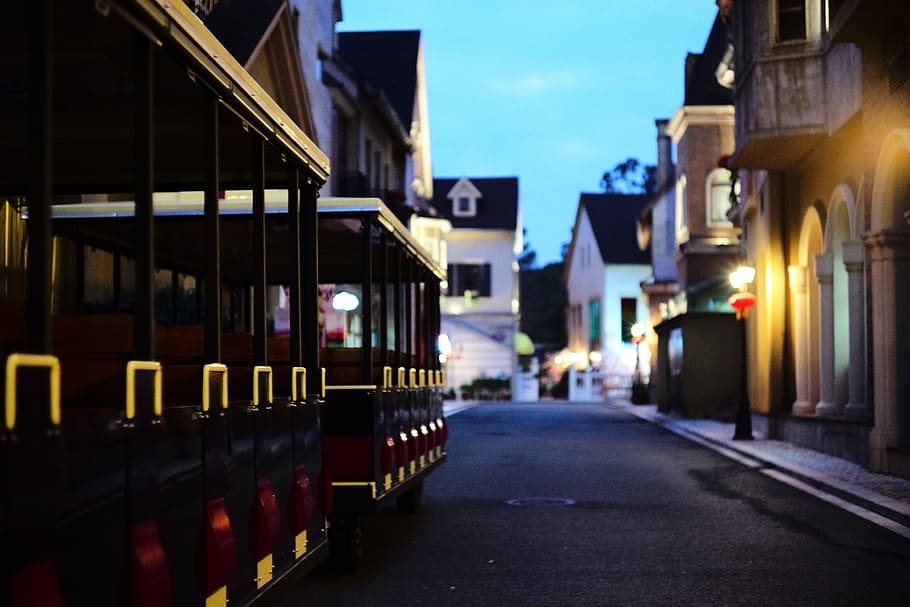 tilt-shift photography of painted house, red and black cable train HD wallpaper