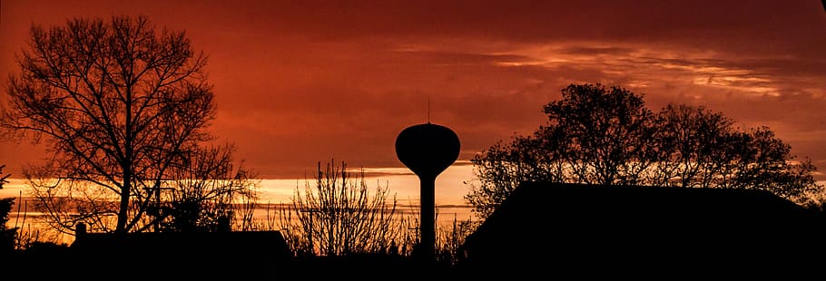sunrise, water tower, sky, trees, city, red, silhouette, plant HD wallpaper