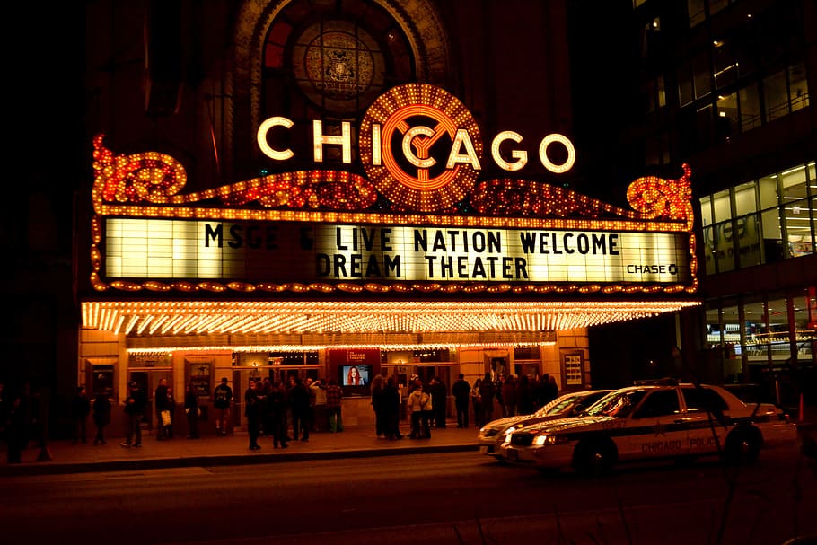 group of people standing outside Chicago cinema theater during night time, HD wallpaper