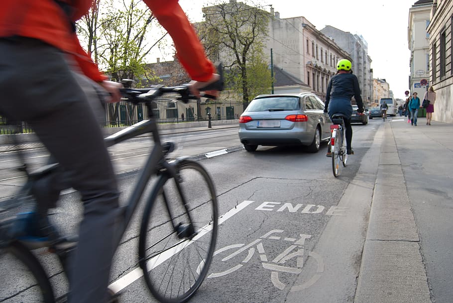 two cyclist on road during daytime, cyclists, cycle path, traffic HD wallpaper
