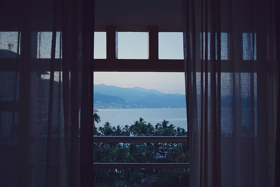 balcony near body of water, opened glass door overlooking beach HD wallpaper