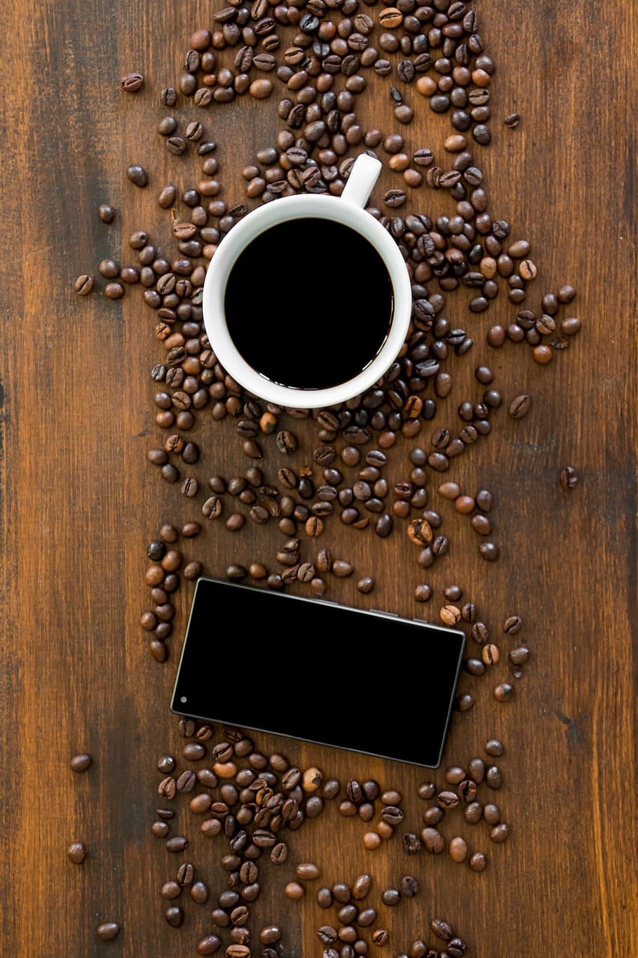 white teacup with coffee beside Android smartphone, work, work and coffee HD wallpaper