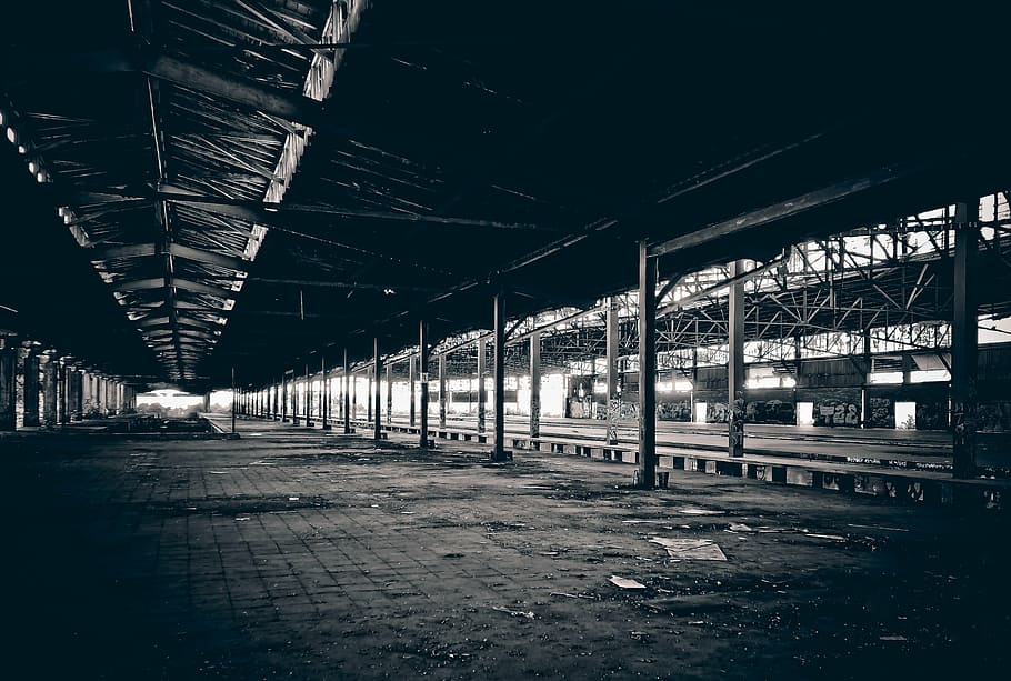 grayscale photography of railway beside station, lost places