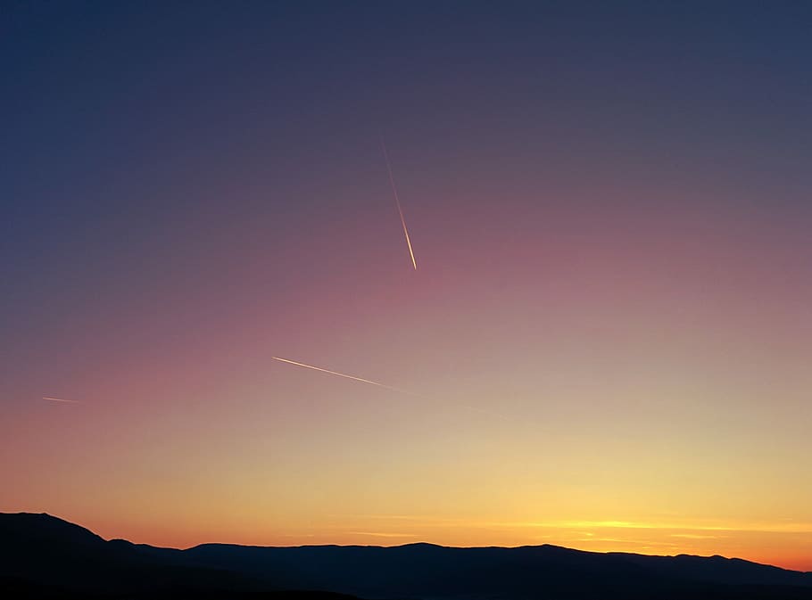 mountain silhouette during golden hour, sunset over horizon, gradient HD wallpaper