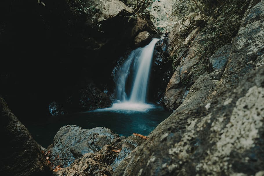 waterfalls near rock mountain, photo of rock formations and waterfalls HD wallpaper