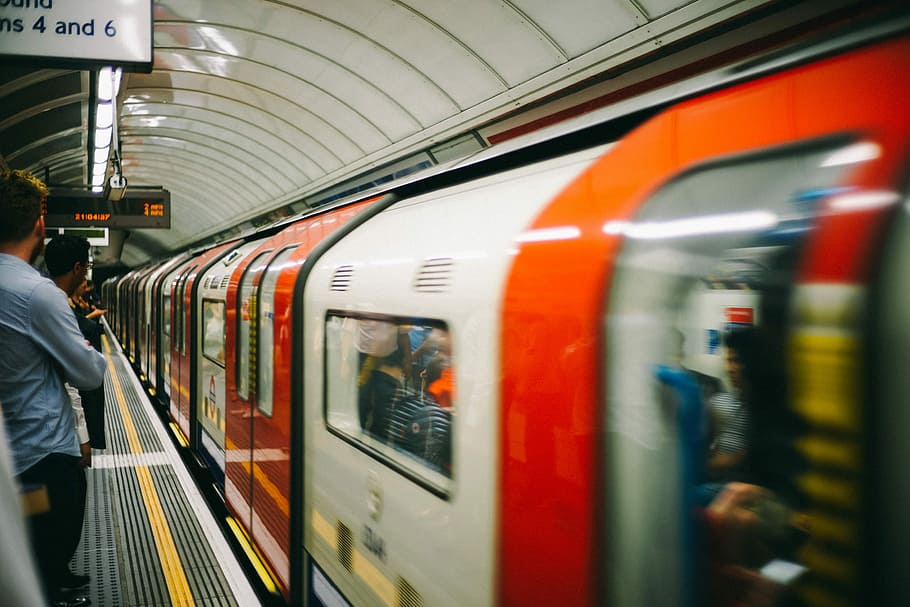 time lapse photography of train, time lapse photo of people inside train HD wallpaper
