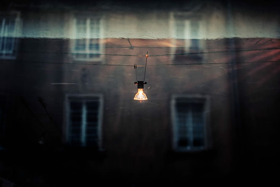 lighted lamp near building, black hanging lamp, city, lightbulb HD wallpaper