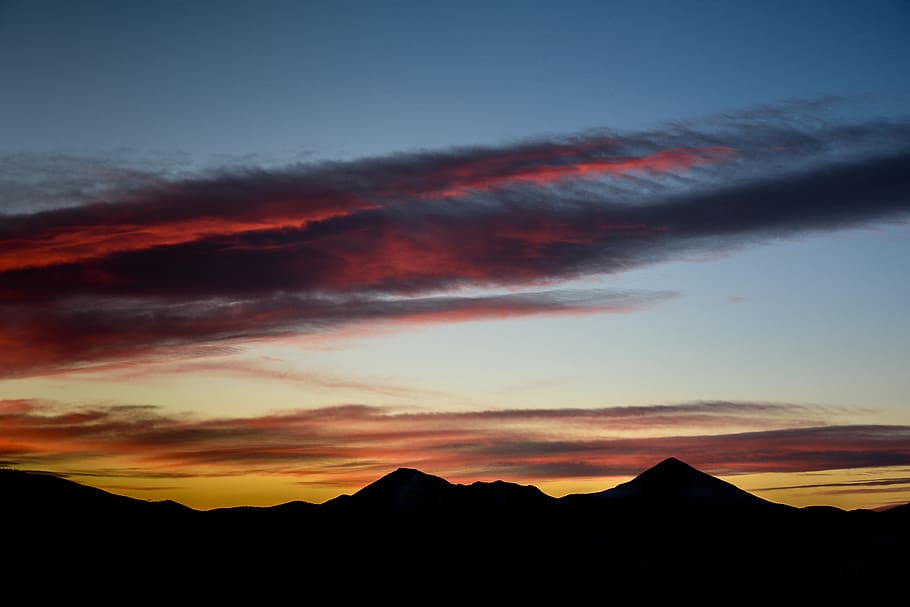 mountains under cloudy sky, silhouette of mountain under cloudy sky at dawn HD wallpaper