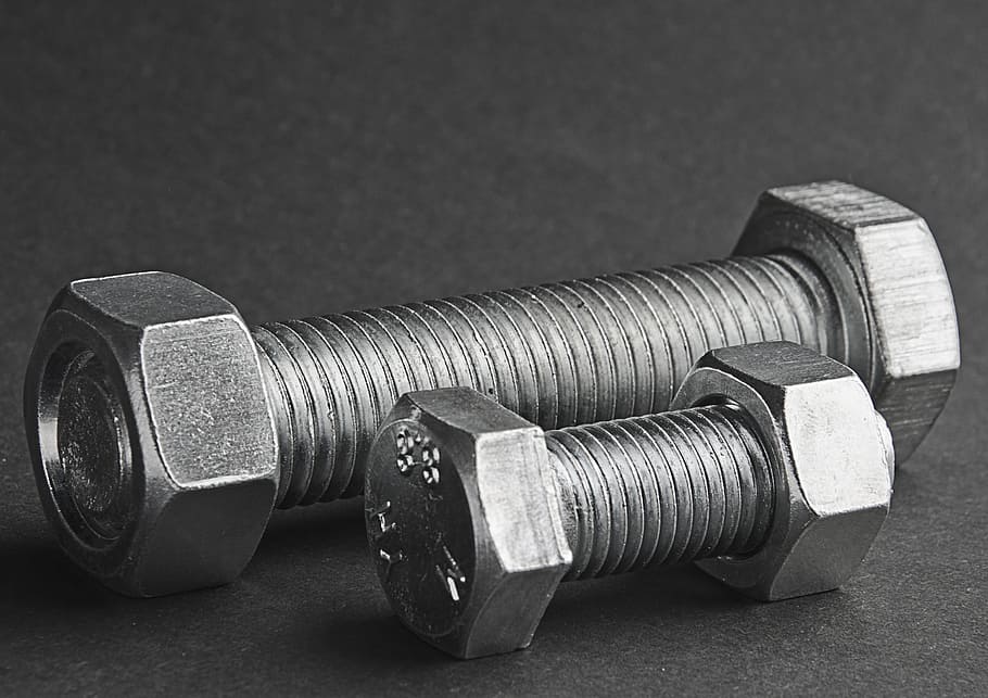 two gray steel bolts and nuts on black surface, the screws HD wallpaper