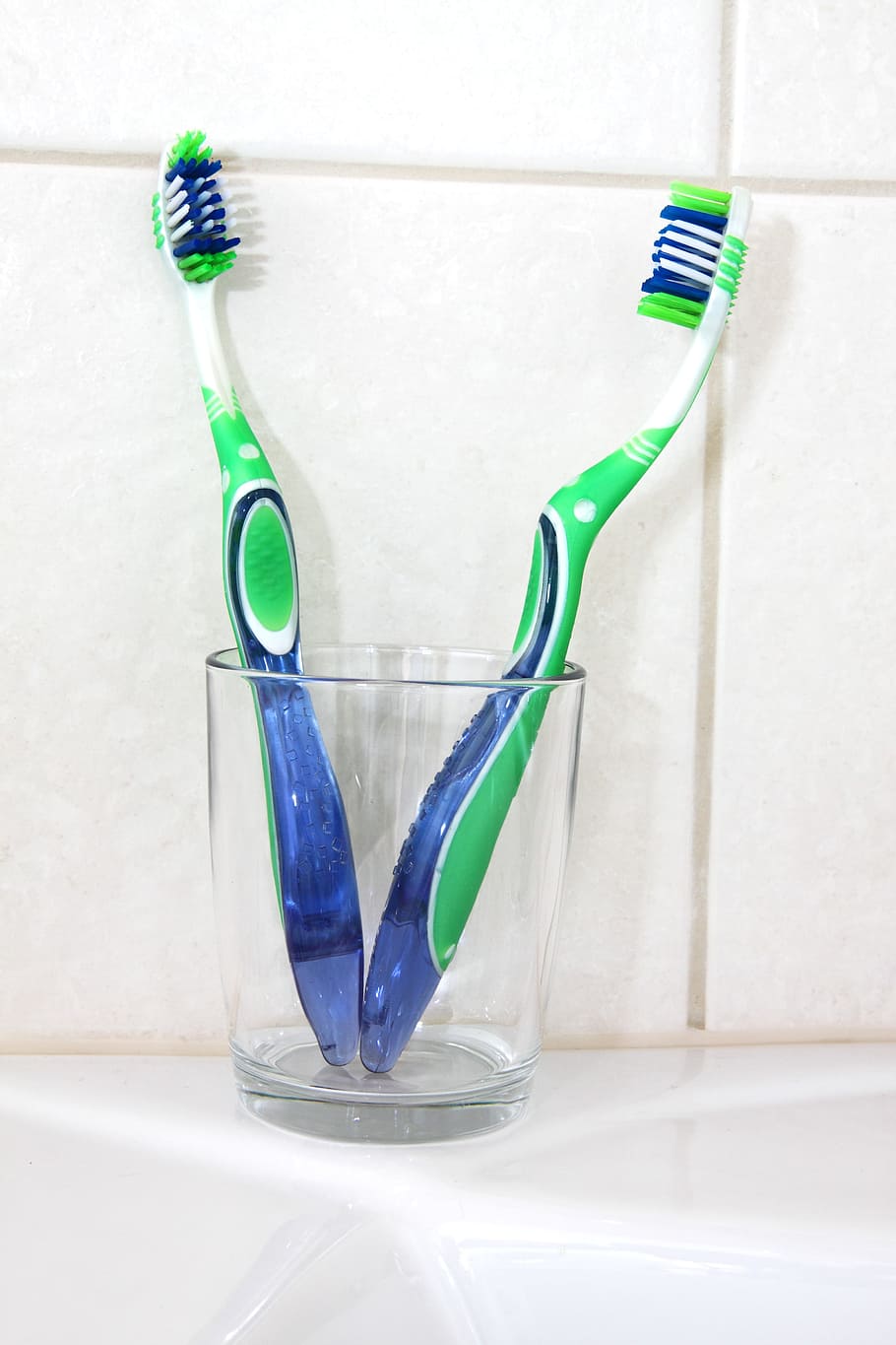 two green toothbrushes in glass, Bathroom, Care, Clean, Cup HD wallpaper