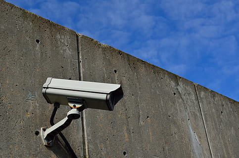 gray bullet-style security camera on wall, cctv, privacy, surveillance HD wallpaper