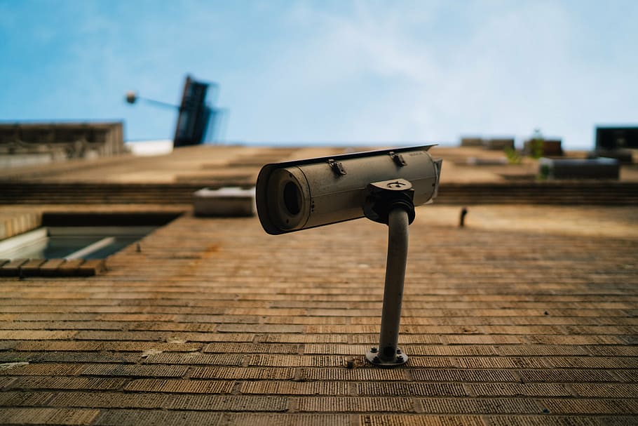 selective focus photography of bullet security camera on brick wall, HD wallpaper