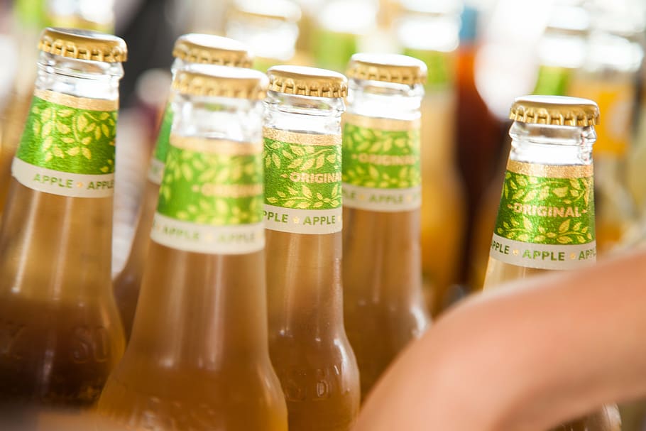 close-up photo of glass bottles, beverages, cold, chilled, refreshment
