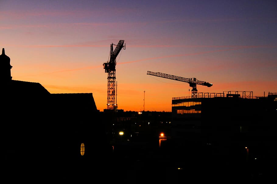 crane and houses during golden hour, silhouette, sun, set, architecture, HD wallpaper
