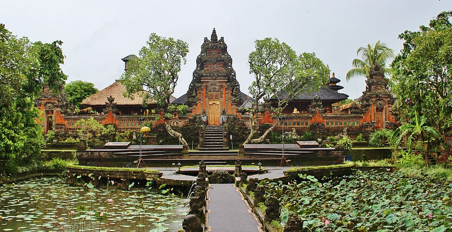 brown and orange concrete shrine, temple, daytime, ubud, indonesia