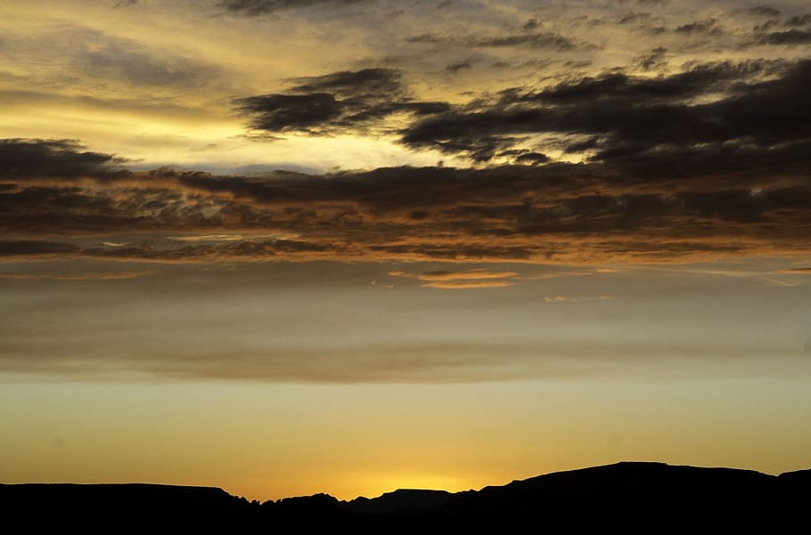 brown sky at sunset, landscape, rocks, silhouettes, dusk, evening HD wallpaper