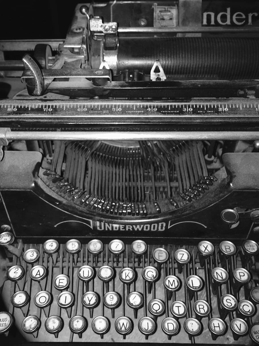 underwood typewriter inside dark room, vintage, hipster, retro