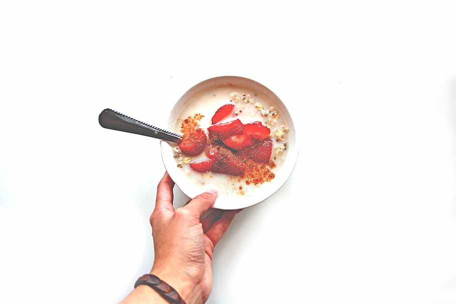 person holding bowl of dessert, sliced, strawberry, white, ceramic HD wallpaper