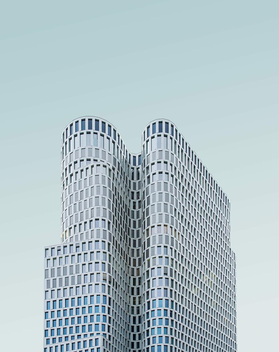 concrete building under white sky during daytime, gray painted building during daytime HD wallpaper