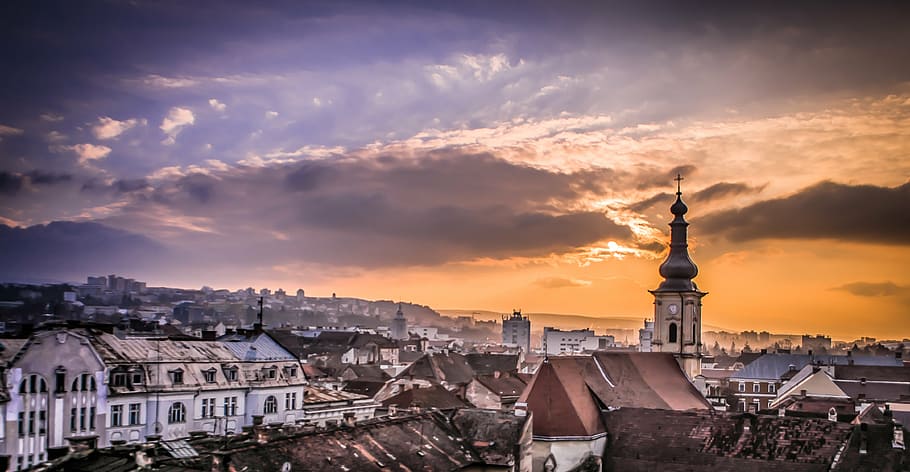 sunset, church, dramatic, clouds, old, town, building, sky HD wallpaper
