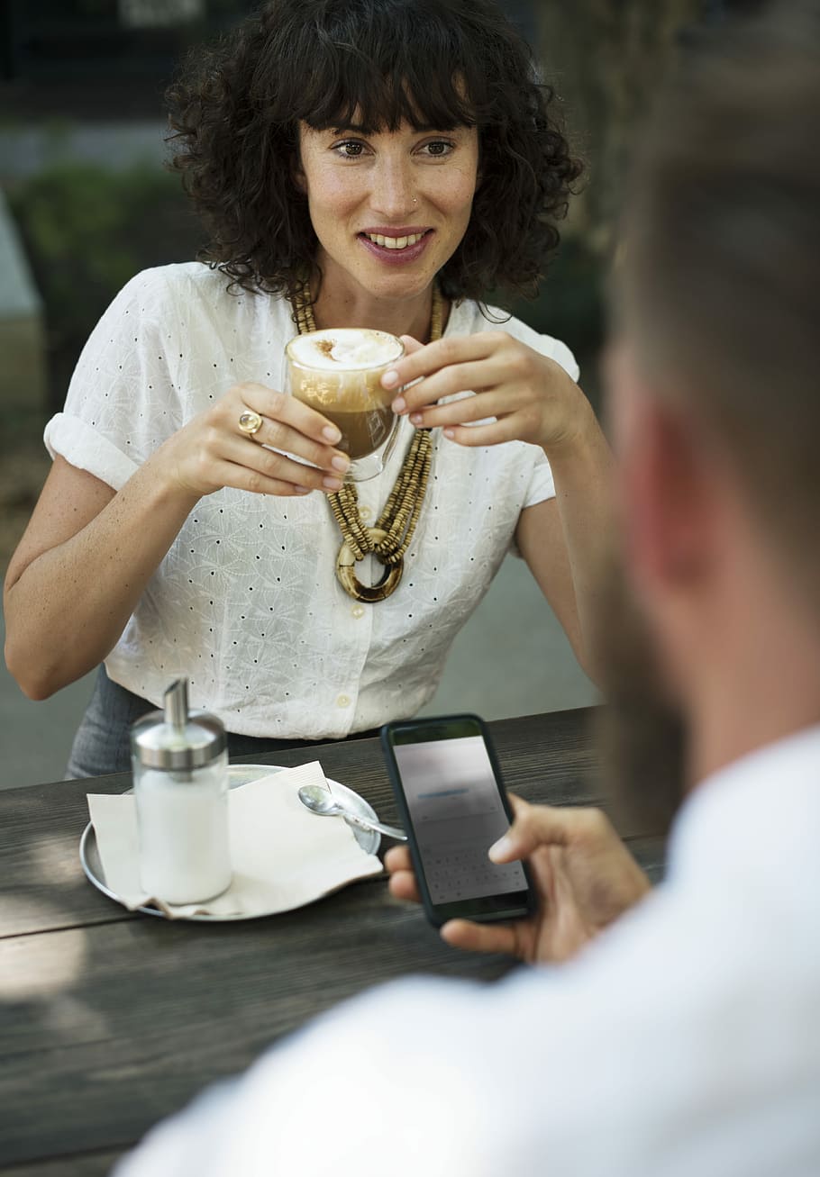 woman in white top holding clear drinking glass, meeting, brainstorming HD wallpaper