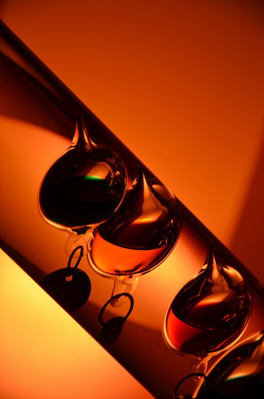 orange, balls, light, motion, thermometer, no people, indoors HD wallpaper