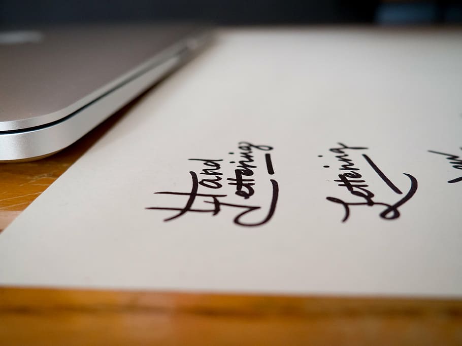 MacBook beside paper, white, black, ink, text, office, work HD wallpaper