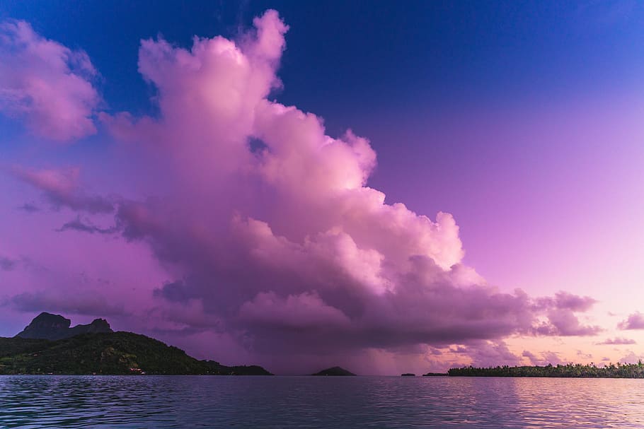landscape photography of mountain surrounded by body of water during daytime, body of water near island HD wallpaper