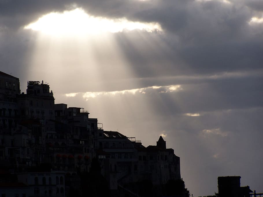white concrete structure under white clouds during daytime HD wallpaper