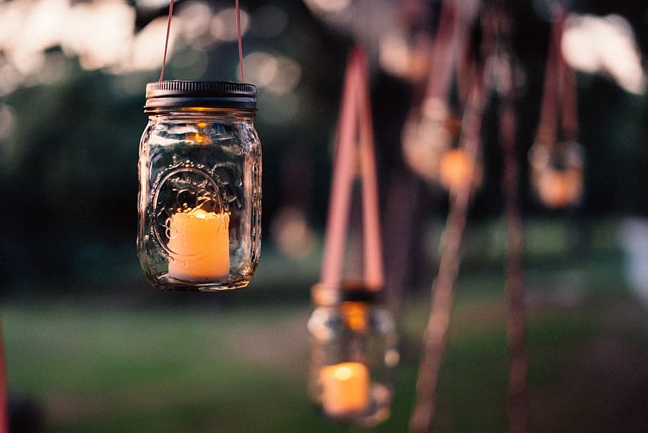 glass mason jar candle holder, selective focus photography of clear mason jar candle lantern HD wallpaper