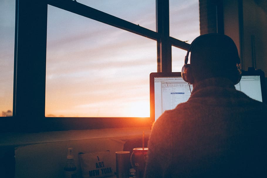 man sitting facing monitor, View, workspace, sunset, working HD wallpaper